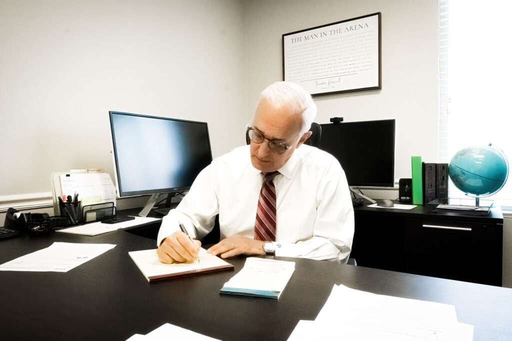 Attorney David Tannen reviewing a divorce case file